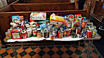 Photograph of donations to the Foodbank at St Mary's Harvest Festival 2024
